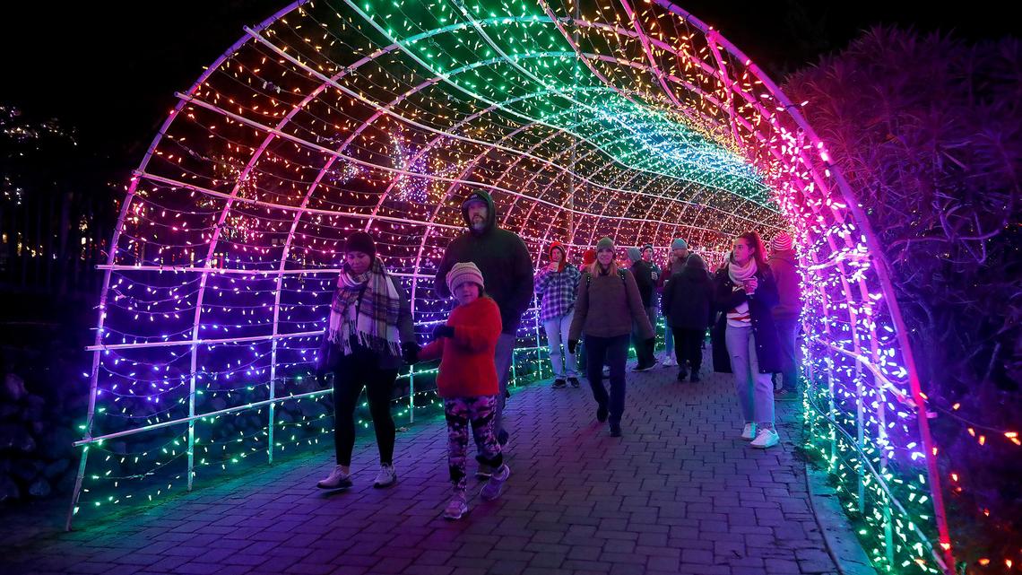 People enjoy the Tunnel of Lights at the Cambria Christmas Market in 2019. The popular San Luis Obispo County holiday event will reopen to the public in November 2022.