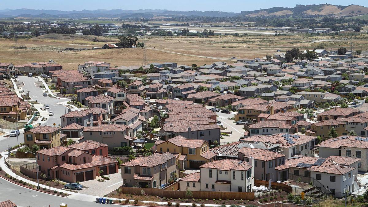 A future Prado Road extension would eventually reach into the vacant area at the top of this picture, past the Toscano and Serra Meadows housing developments, seen here in a view from from San Luis Obispo’s South Hills on June 20, 2023.