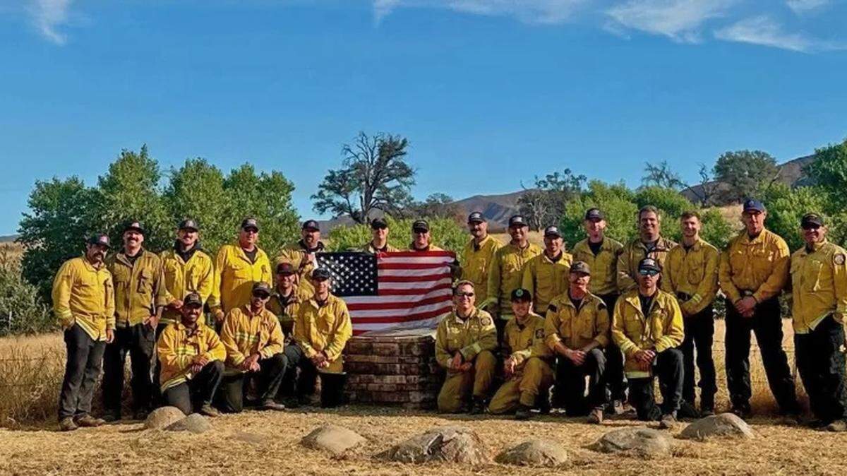 A strike team made up of firefighters from the Sacramento area on the Central Coast for the Gifford Fire paused to spruce up a memorial for the four men killed in the 1979 Spanish Ranch Fire in the same area.