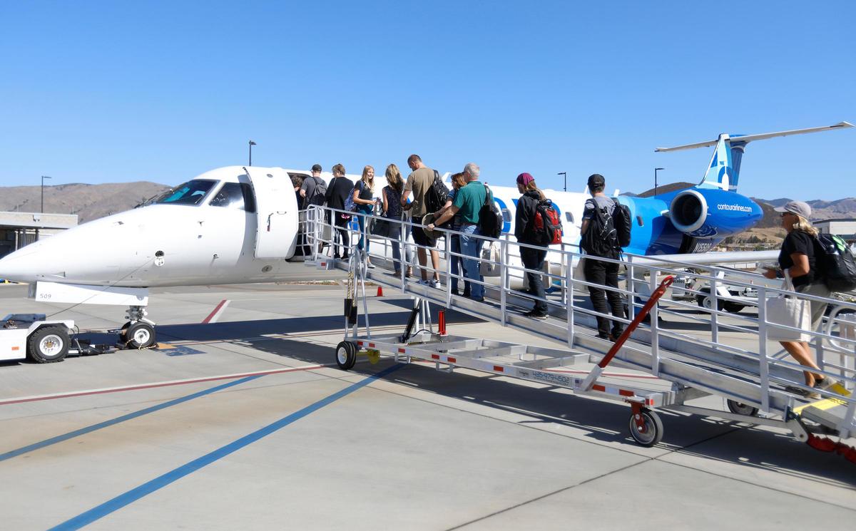 Passengers board the first from San Luis Obispo County Regional Airport to Las Vegas on Thursday.