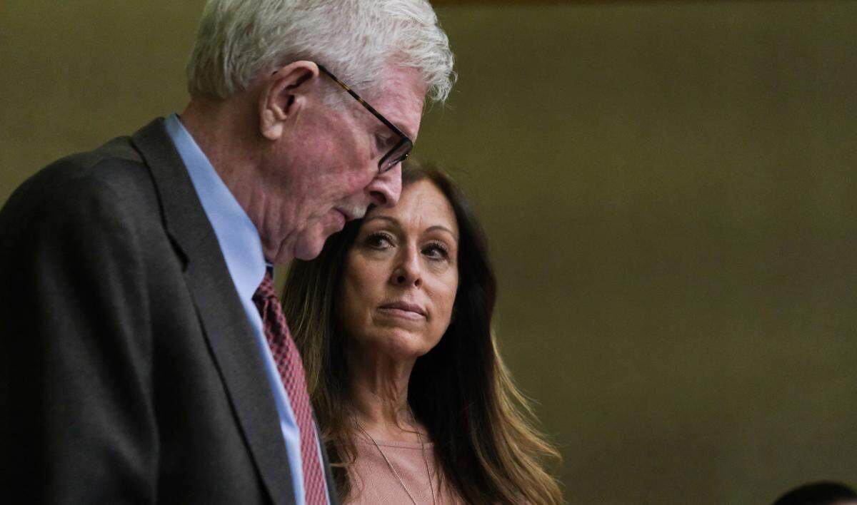 Defense attorney James Murphy, left, and former San Luis Obispo County Board of Supervisor candidate Michelle Marie Morrow during her sentencing hearing in San Luis Obispo Superior Court on April 7, 2025. She was sentenced to 90 days in jail and two years of probation for election fraud crimes.