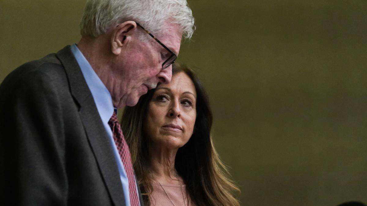 Defense attorney James Murphy and former San Luis Obispo County Board of Supervisors candidate Michelle Morrow during her sentencing hearing in San Luis Obispo Superior Court on April 7.