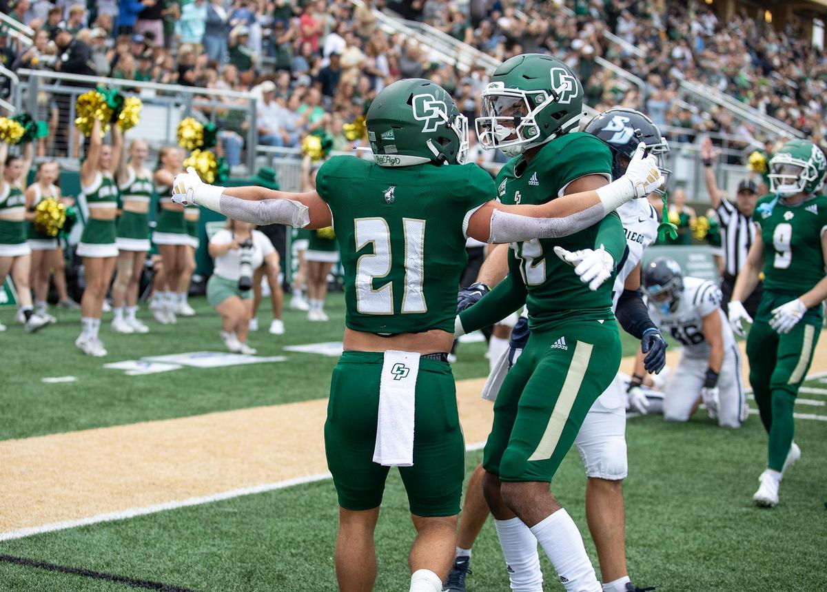 Mustang players celebrate a touchdown in Cal Poly’s 27-10 win over the University of San Diego at Alex G. Spanos Stadium on Sept. 2, 2023.