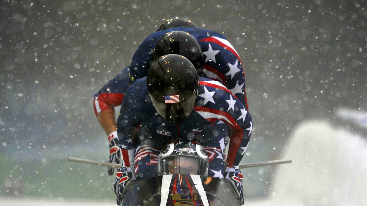 U.S. bobsledders, led by Steven Holcomb, take off en route to a track record in the men's four-man bobsleigh. (Wally Skalij/Los Angeles Times/MCT)