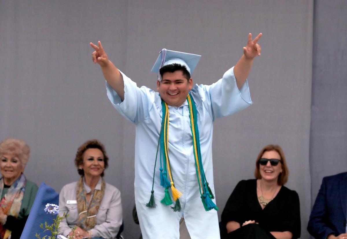 Alejandro Mejia throws the graduates double peace signs. Central Coast New Tech High School honored 57 graduates in the Class of 2025 on June 7, 2025. Students are heading to schools like UC Davis, Cal Poly and UC Berkeley.
