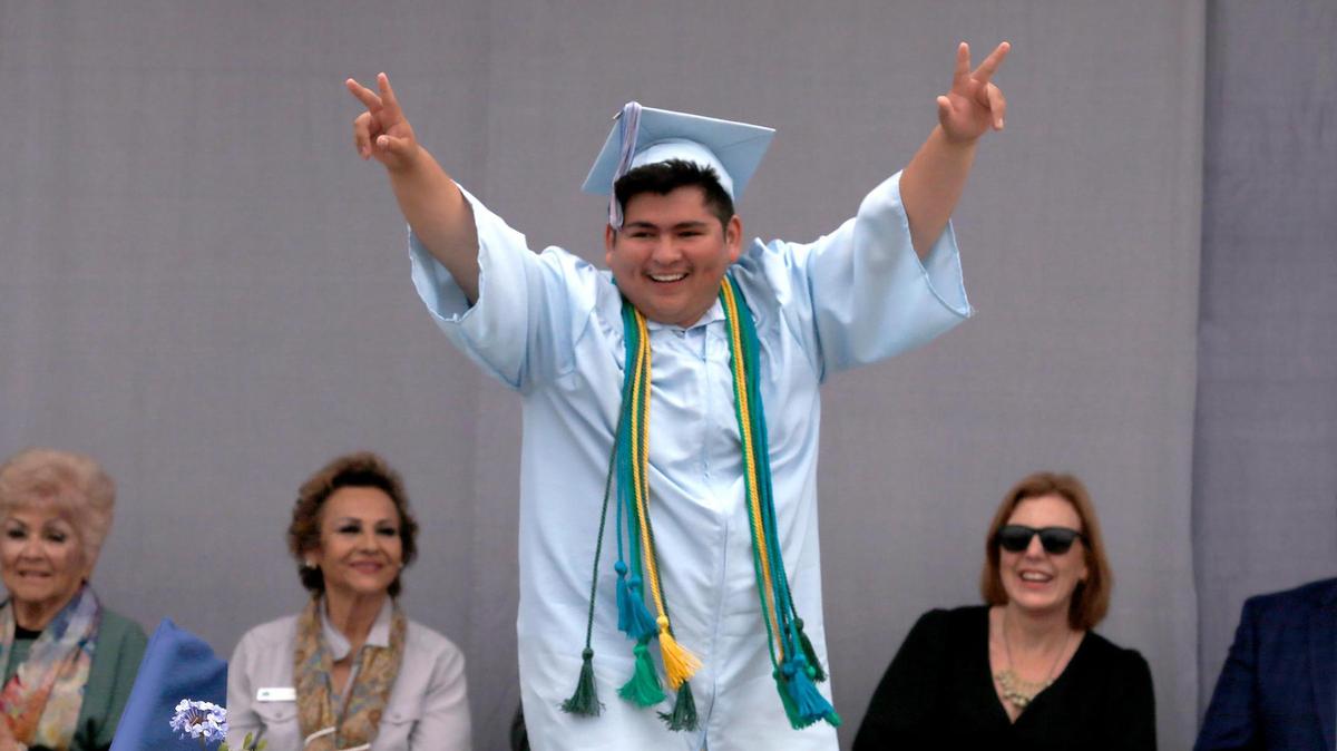Alejandro Mejia throws the graduates double peace signs. Central Coast New Tech High School honored 57 graduates in the Class of 2025 on June 7, 2025. Students are heading to schools like UC Davis, Cal Poly and UC Berkeley.