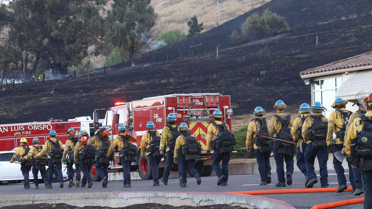 A 50-acre fire on the hill behind Bishop Street in San Luis Obispo caused thousands of households to lose power and forced one neighborhood to evacuate on Tuesday, Aug. 20, 2024. Approximately 100 personnel from the SLO City Fire Department, SLO Police Department and Cal Fire responded to the fire.