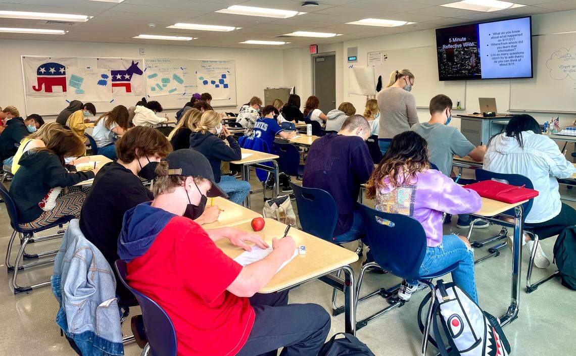 Students in Laura Van Zee’s U.S. History class at Morro Bay High School write down what they know and what questions they have about 9/11. These students, most of whom are 16 or 17 years old, were born after the tragic day.