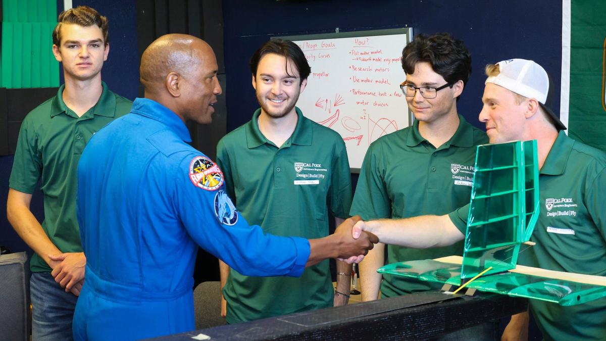 Cal Poly graduate and NASA astronaut Victor Glover visited campus May 29, 2024. He talks to engineering students, from left, Cole Bushur, Nicholas Toal, Andrew Whitacre and Andrew Sugamele.