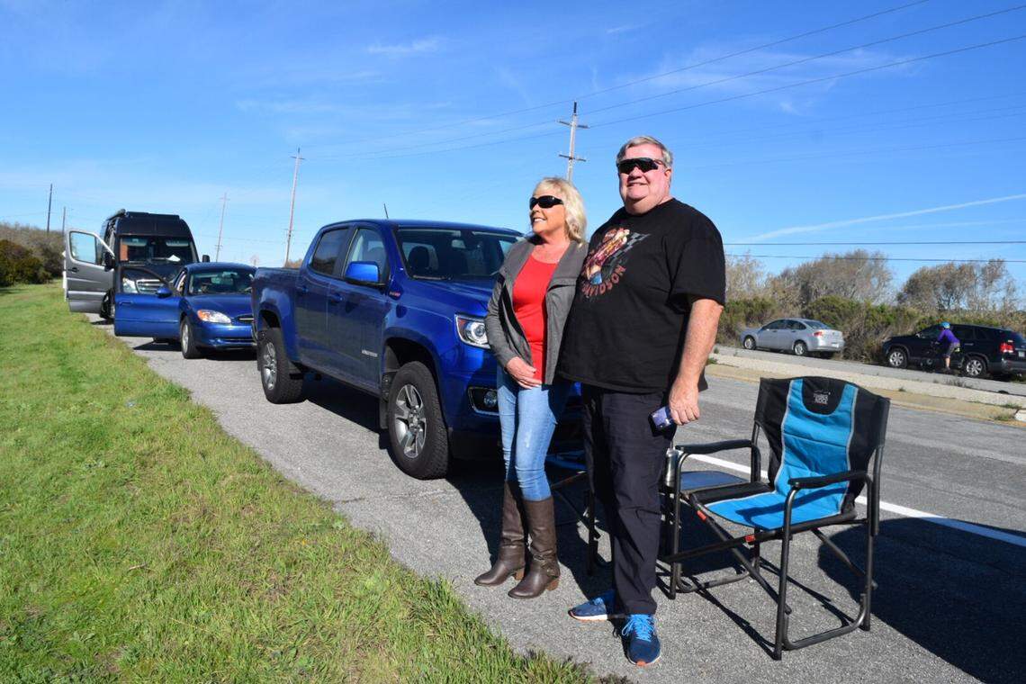 Shelly and Loyd Champion of Porte Hueneme get ready for the Delta IV heavy rocket launch from Vandenberg Air Force Base on Saturday morning.