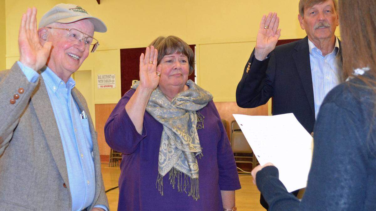 New members of the Cambria Community Services District Board of Directors — from left, Donn Howell and Cindy Steidel — join continuing Director David Pierson Dec. 13 in taking their oaths of office from Deputy District Clerk Haley Dodsen, at right.