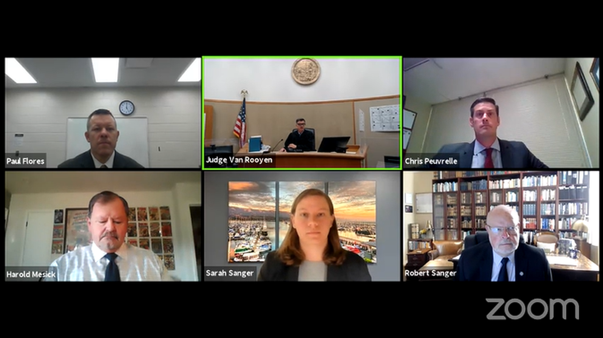 A pre-preliminary hearing is held in San Luis Obispo Superior Court on July 12, 2021, in the murder case of missing Cal Poly freshman Kristin Smart. Clockwise from top left: Paul Flores, who is charged with Smart’s murder; Superior Court Judge Craig van Rooyen; deputy district attorney Christopher Peuvrelle; Robert Sanger, attorney for Paul Flores; Sarah Sanger, also an attorney for Paul Flores; and Harold Mesick, attorney for Ruben Flores, who was not present and is charged with accessory.