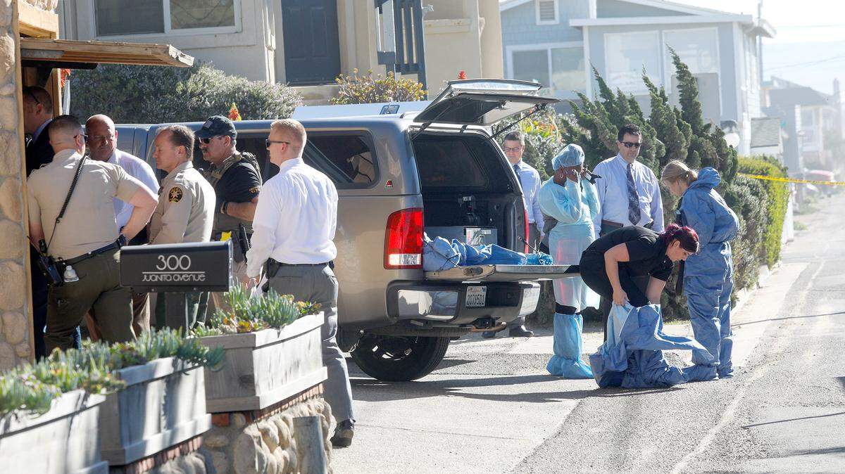 Investigators with the San Luis Obispo County Sheriff’s Office prepare to gather evidence at a home, not pictured, on Strand Way in Oceano after Lawrence Bross was found dead there in 2019.