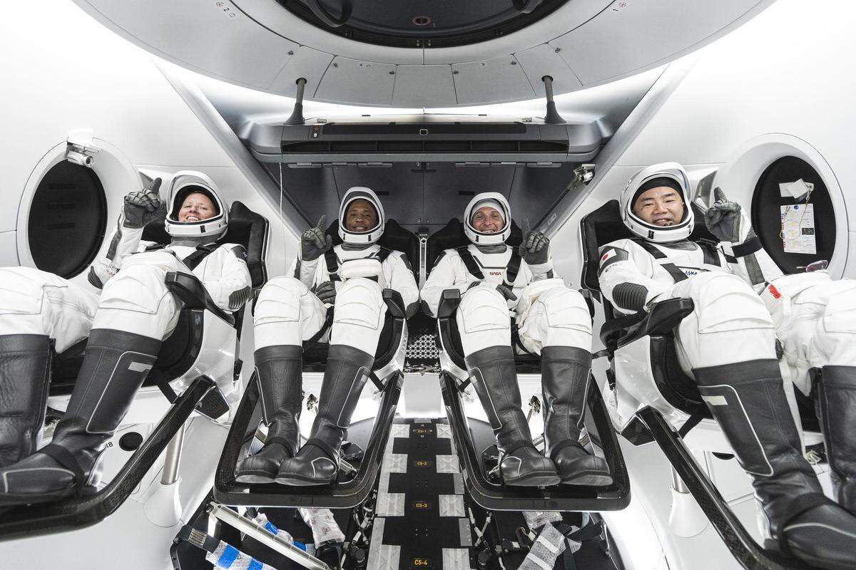 Victor Glover, a 1999 graduate of Cal Poly, sits with the other crew members in SpaceX’s Crew-1 Dragon capsule. From left to right: Shannon Walker, Glover, Mike Hopkins and Soichi Noguchi.