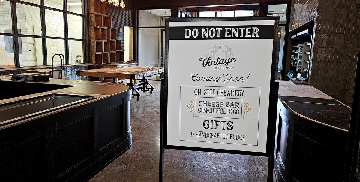 SLO Ranch Farms has six new business opening soon. Vintage Cheese Co. signs say “coming soon.”