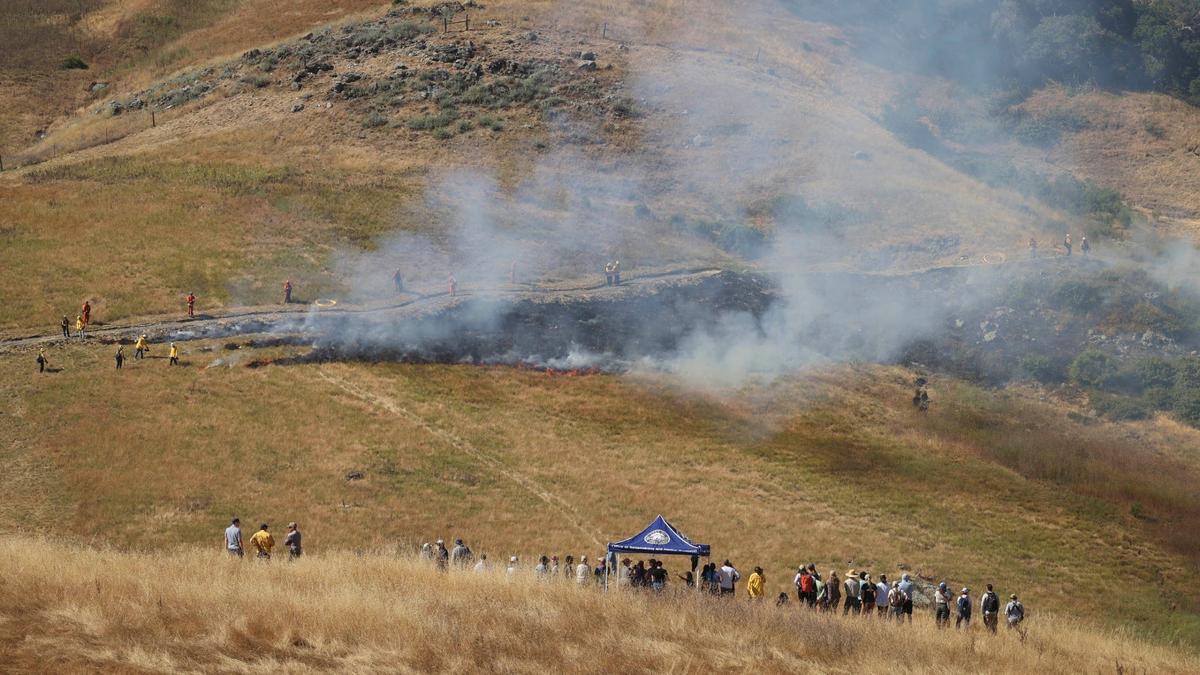Observers to the first cultural burn in San Luis Obispo County in over a century. The yak tit?u tit?u yak tilhini Northern Chumash Tribe lead a 15-acre cultural burn at the Johnson Ranch Open Space on Tuesday. June 18, 2024. Several agencies were also involved including Calfire, San Luis Obispo City Fire Department, and resource conservation agencies from the city, county and state.
