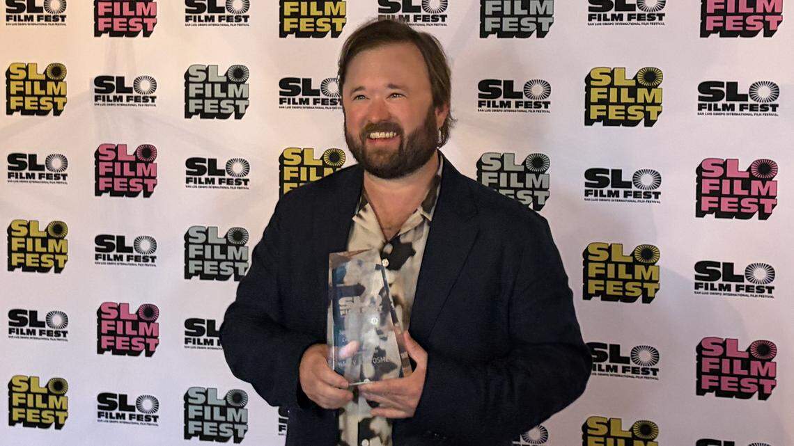 Actor Haley Joel Osment holds his Spotlight Presentation: Craft in Focus Award at the San Luis Obispo International Film Festival on Saturday, April 25, 2026.