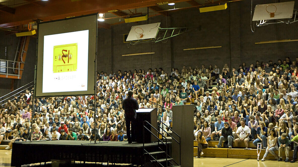 Author Jay Asher speaks at an assembly at San Luis Obispo High School, his alma mater, on Wednesday as he kicks off his "50 States Against Bullying" tour.