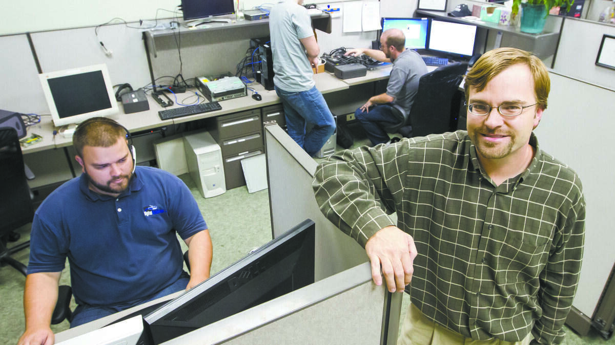Joshua Erdman, right, owns Digital Foundation in San Luis Obispo. At left is Kevin Davies, a network service technician at Digital Foundation.