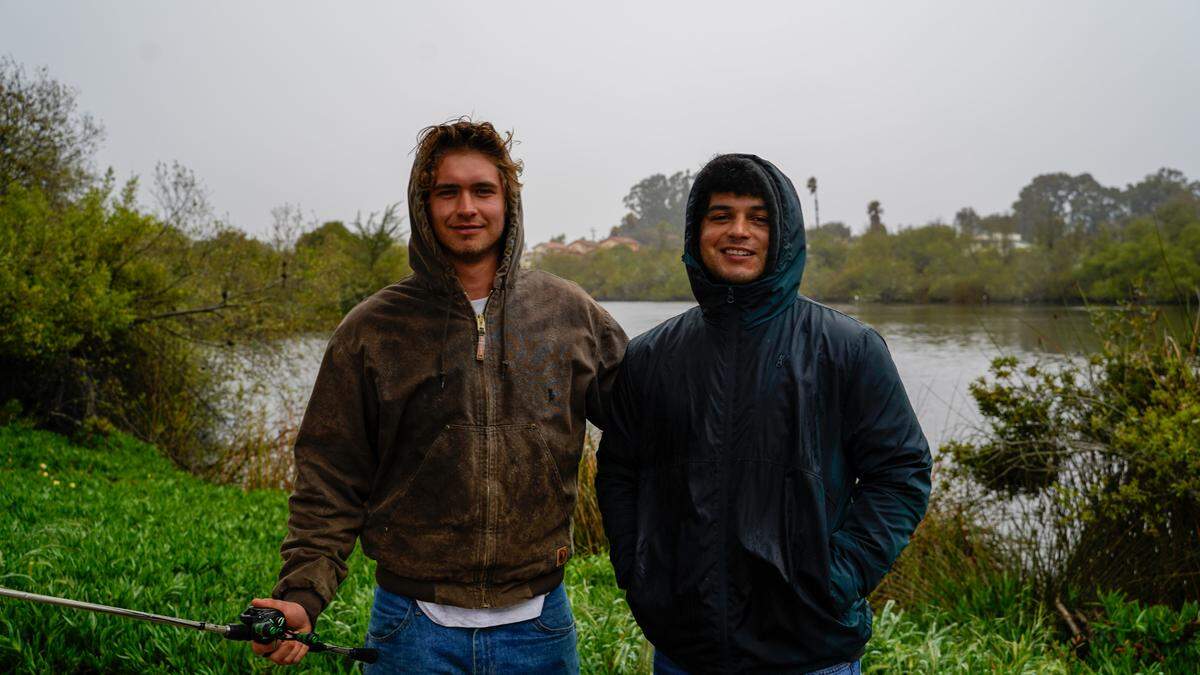 Santa Maria residents Matt Simms, left, and Joe Cardenas visited the Oceano Lagoon hoping to fish on March 14, 2023, unaware that the area was under an evacuation order.