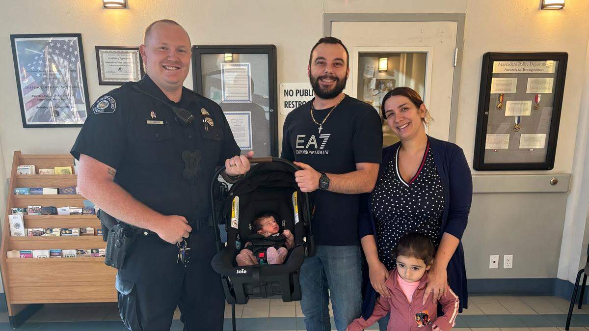 Atascadero Police Department officer Alan Hurst saved a 10-day-old baby’s life on Oct. 22, 2025. The family visited him at the office the next day to thank him.