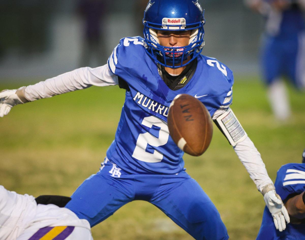 Ian Lambright corrals a fumble for Morro Bay in a game the Pirates led 28-13 over Fresno before it was canceled due to lightning on Sept. 9, 2022.