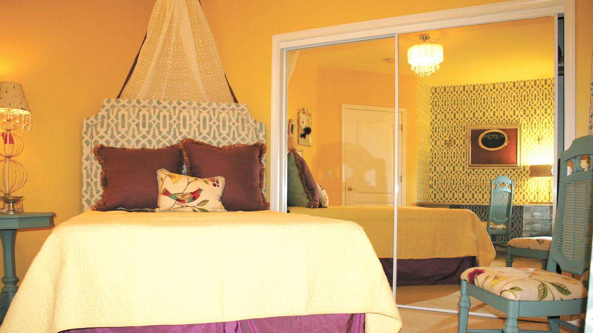 Palma made many of these bedroom items including the upholstered headboard.