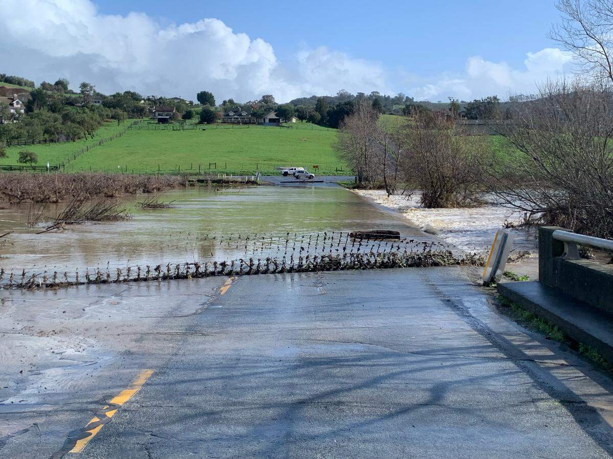 Flooding is seen on the east side of Highway 101 at San Luis Bay Drive near Avila Beach on Tuesday, Jan. 10, 2023.