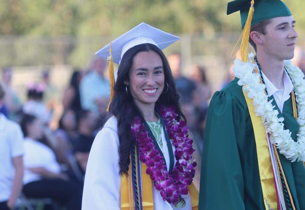 Natalija Pecenkovic smiles at the camera as she prepares to walk at Templeton High School’s graduation ceremony on June 4, 2026. She was one of 186 students to graduate.