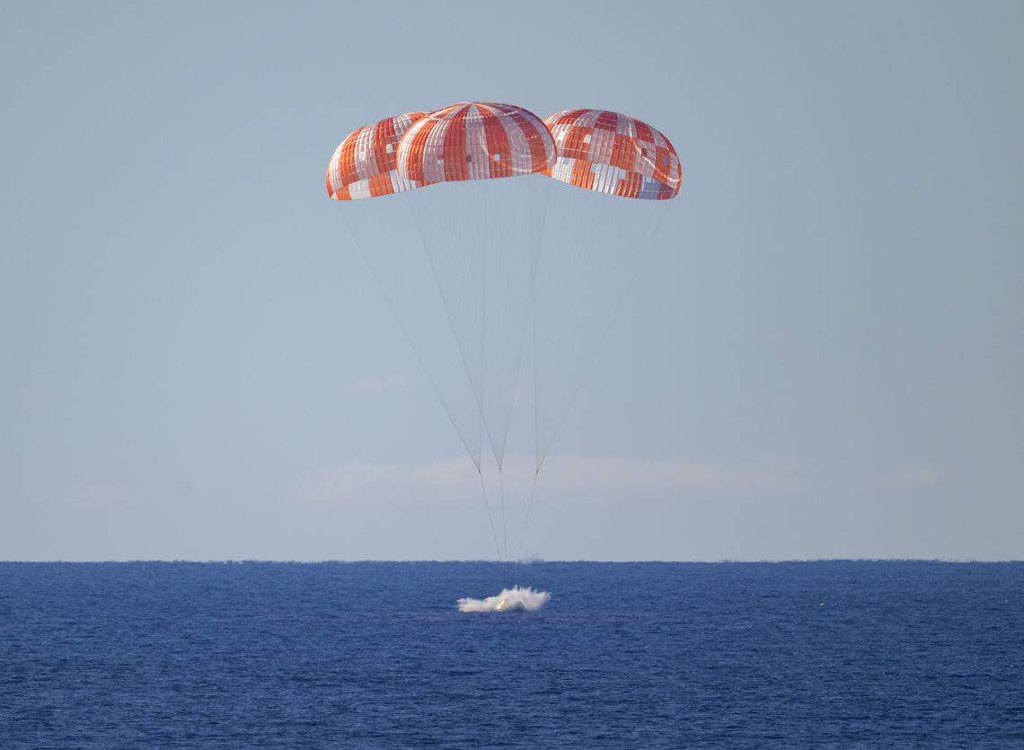 NASA’s Orion spacecraft with Artemis II NASA astronauts Reid Wiseman, commander; Victor Glover, pilot; and Christina Koch, mission specialist; and CSA (Canadian Space Agency) astronaut Jeremy Hansen, mission specialist, lands in the Pacific Ocean off the coast of California, Friday, April 10, 2026.