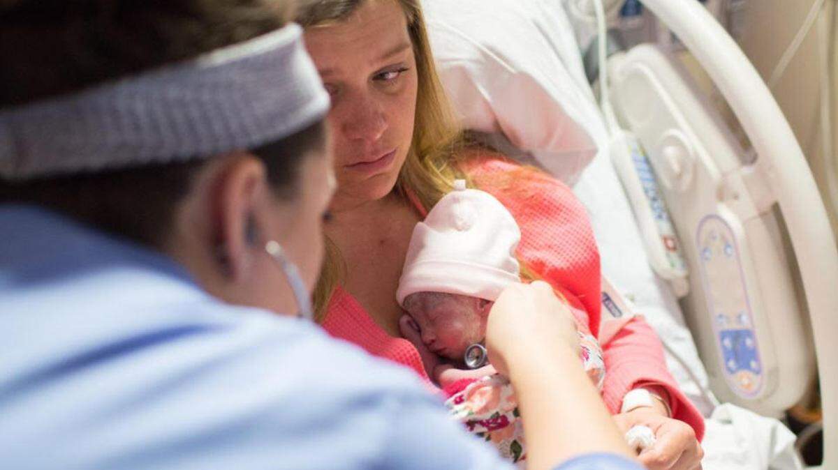 Ashley Agnitch holds her daughter, Greta Agnitch, shortly after her birth in April 2017. Greta Agnitch was born with Trisomy 18 and died shortly after her birth.