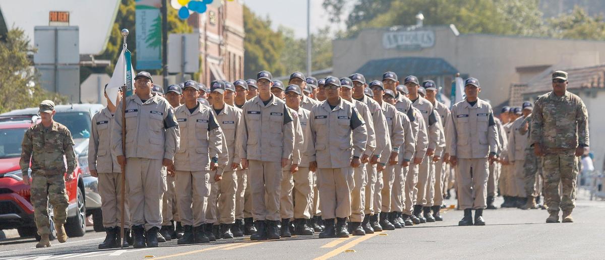Cadets from the Grizzly Youth Academy march in the Pinedorado Parade in 2018. A former commander of the program has been accused of sexual harassment.