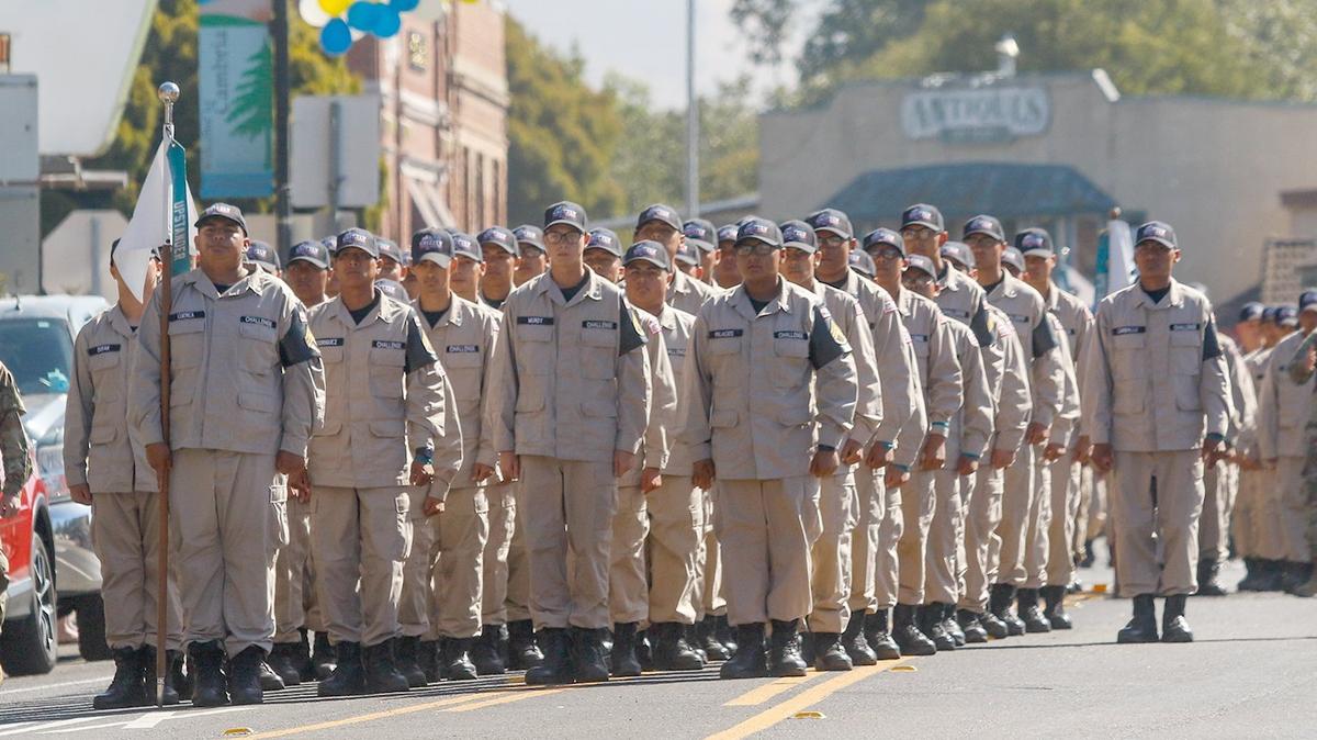 In this pre-COVID file photo, Grizzly Youth Academy members march in the Pinedorado Parade in Cambria.