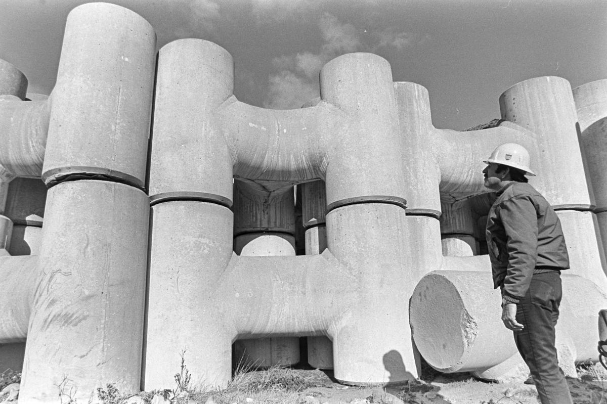 Pete Johnson, a civil inspector at the Diablo Canyon nuclear power plant, looks at stockpiled breakwater supports. The concrete tri-bar units weigh 20 tons each. Seen here on January 29, 1981.