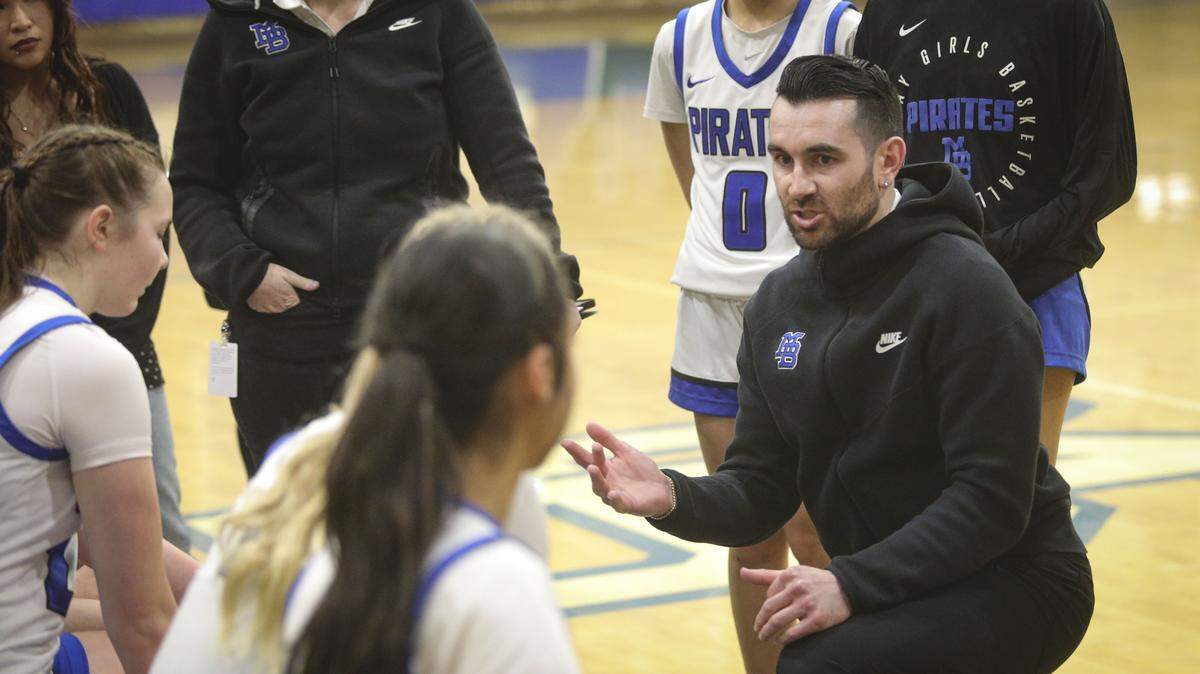 Alex Engel coaches in the late minutes. Morro Bay beat Porterville 37-25 to advance to the semi-final game in the Division III CIF Central Section Girls Basketball Championships.
