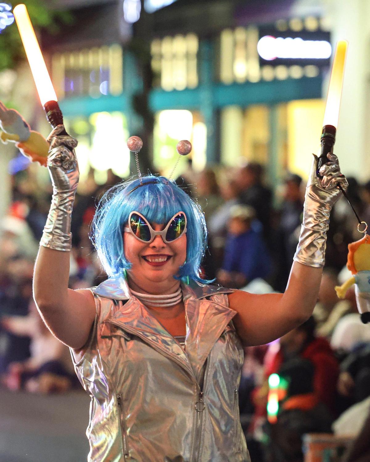 Mercedes Lopez with the Sunset Honda entry at the 47th Annual Downtown Holiday Parade in San Luis Obispo on Dec. 1, 2023. The parade theme was “Out of the World!”