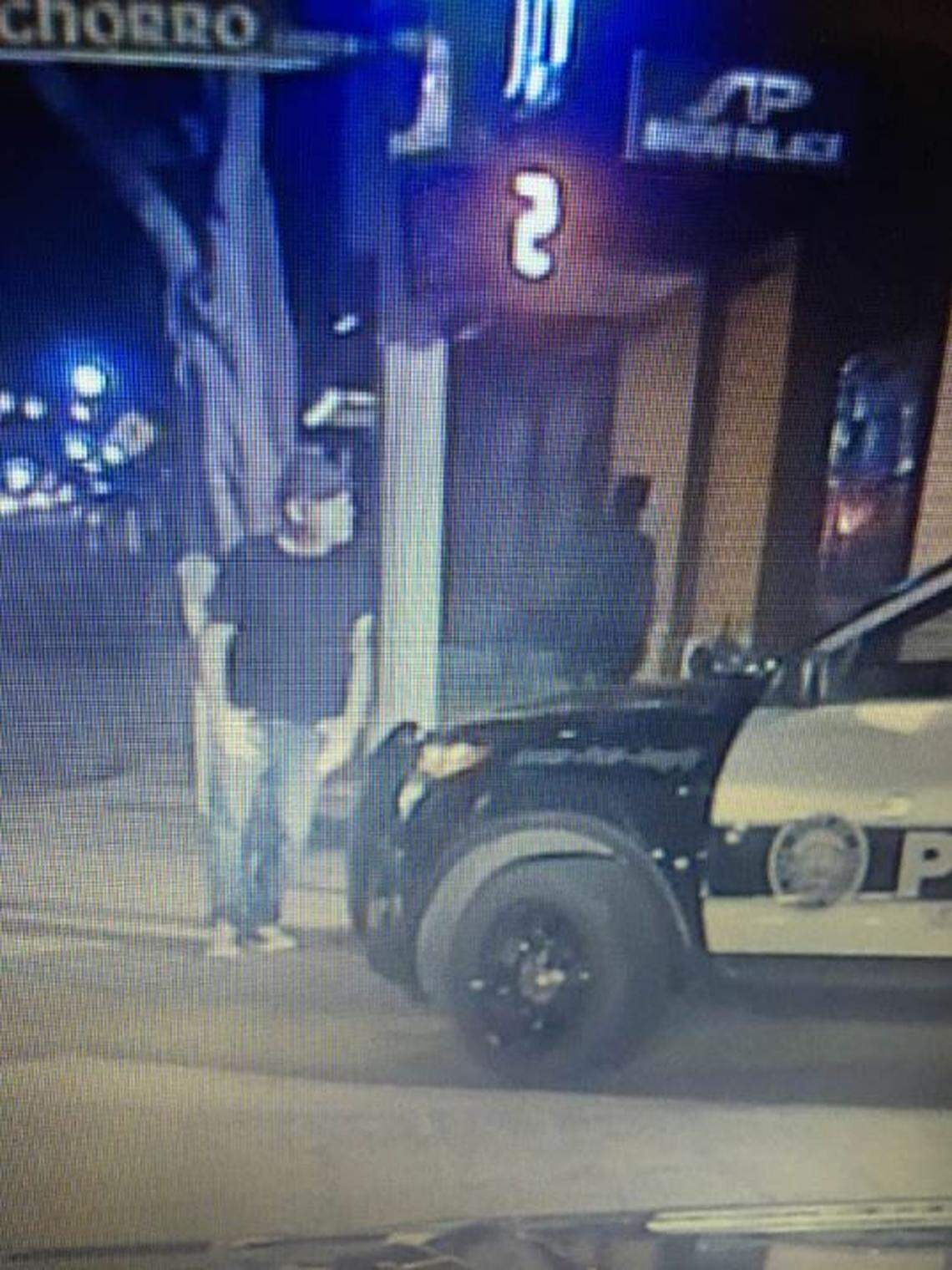David Allen Knight of Atascadero is seen in surveillance footage watching emergency responders on the corner of Marsh and Chorro streets, feet away from where Thomas Jodry died in a fall from the Chorro Street parking garage on Sept. 14, 2019.