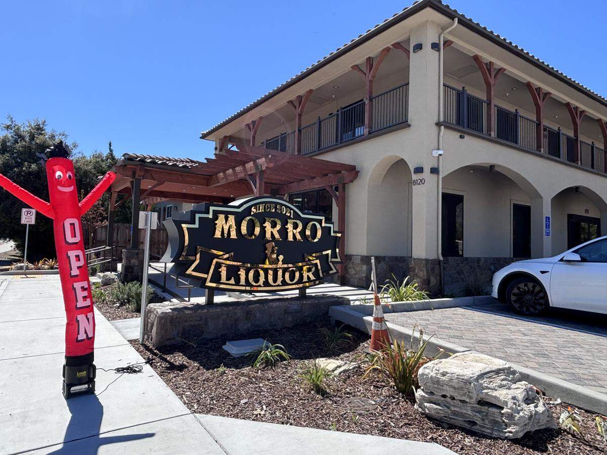 Morro Liquor in Atascadero opened Monday, March 16, 2026, displaying a golden sign in front of its two-story business on Morro Road.