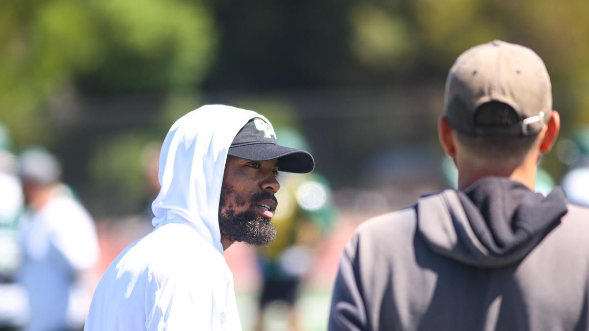 Asa Jackson is the assistant coach for cornerbacks, returning to Cal Poly after playing six seasons in the NFL. Cal Poly is preparing for its 2022 season opener.
