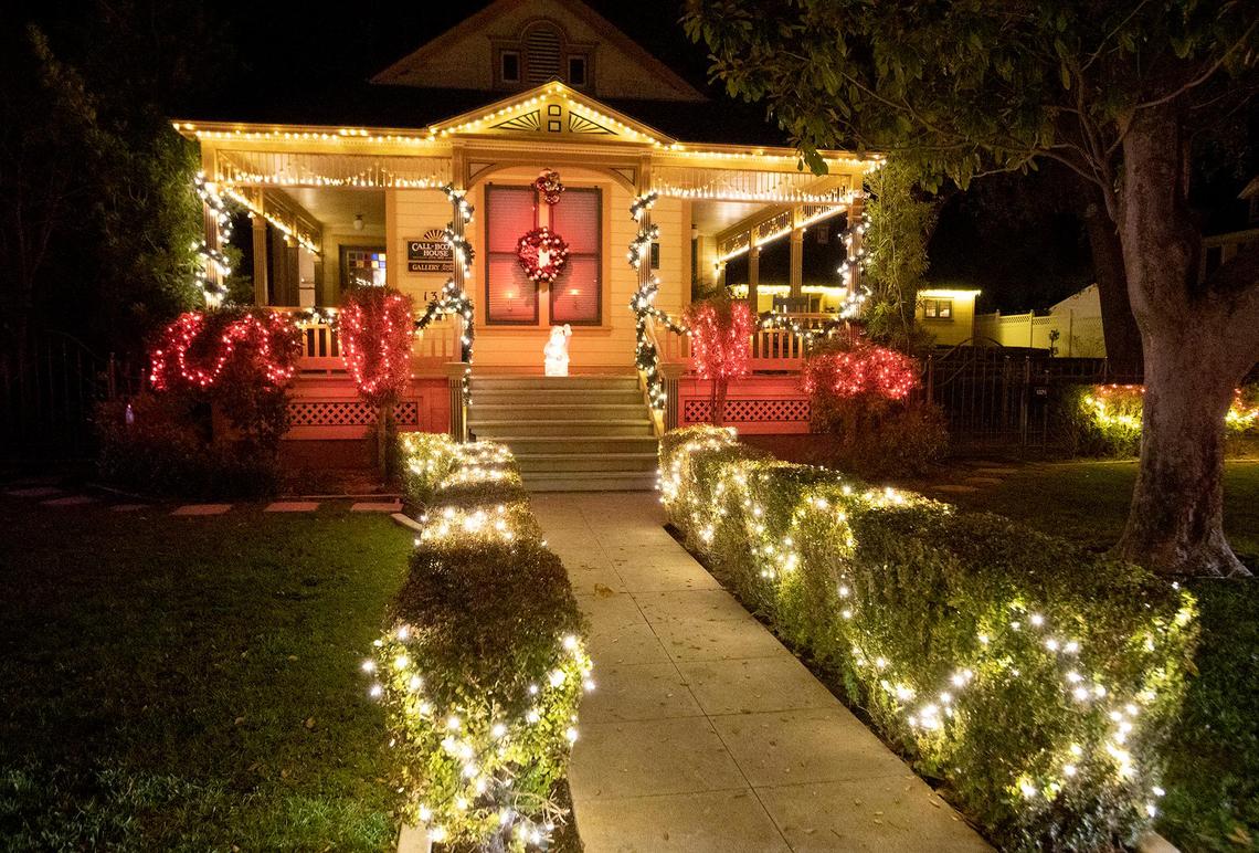 The Vine Street Victorian Showcase held a drive-through once again on Saturday, Dec. 11, 2021. Santa and Mrs. Claus drove up and down Vine Street in the 35th rendition of the popular event. Ebenezer Scrooge drove by in a red convertible grumbling all the while.