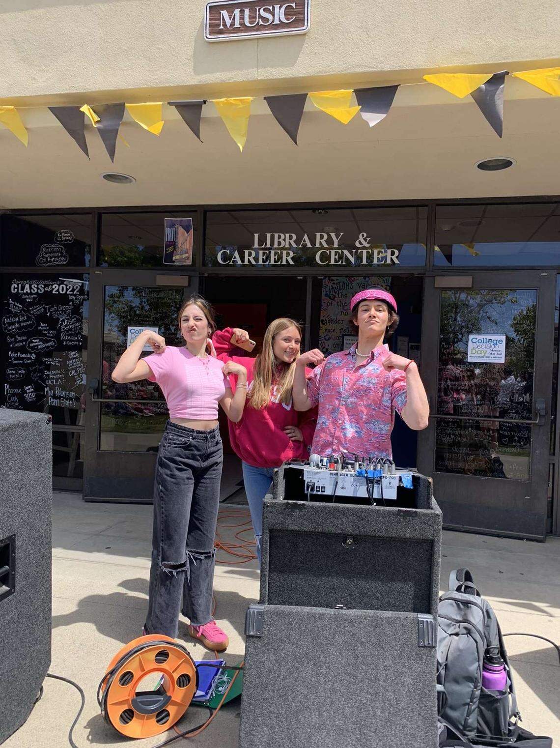 From left to right: San Luis Obispo High School students Eden Lerner, Alex Thorne and Caesar Holifield pose May 12, 2022, during a walkout event at the school rallying for reproductive and abortion rights. The event was spurred by a leaked draft U.S. Supreme Court opinion that would overturn Roe v. Wade.