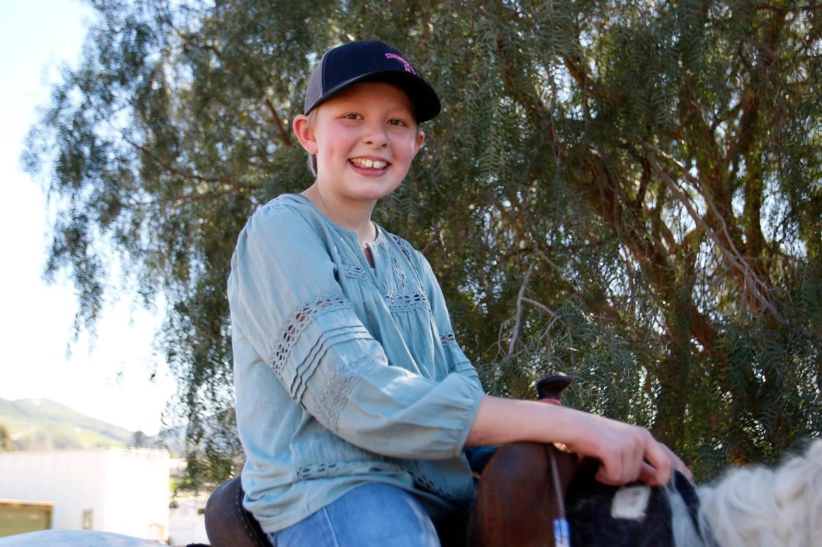 Maddie Owens was diagnosed at age 10 with Ewing osteosarcoma, an aggressive form of bone cancer. Now age 11, she is working with the Cal Poly Rodeo Team through the Mark-a-Wish Foundation to fulfill her wish to be a rodeo barrel racer.