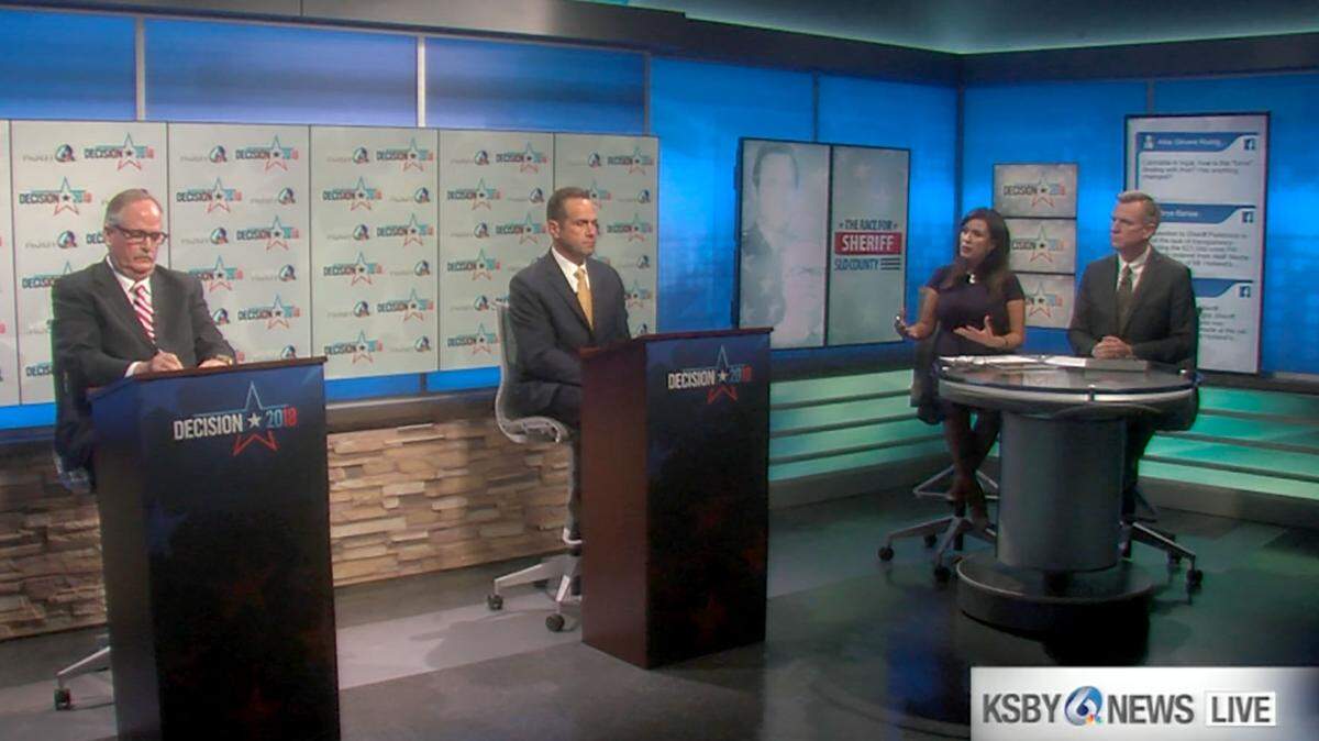 Sheriff Ian Parkinson, center, and his challenger, Greg Clayton, left, met for a live televised debate Wednesday night at KSBY's studios. the debate was moderated by Carina Corral and Richard Gearhart.