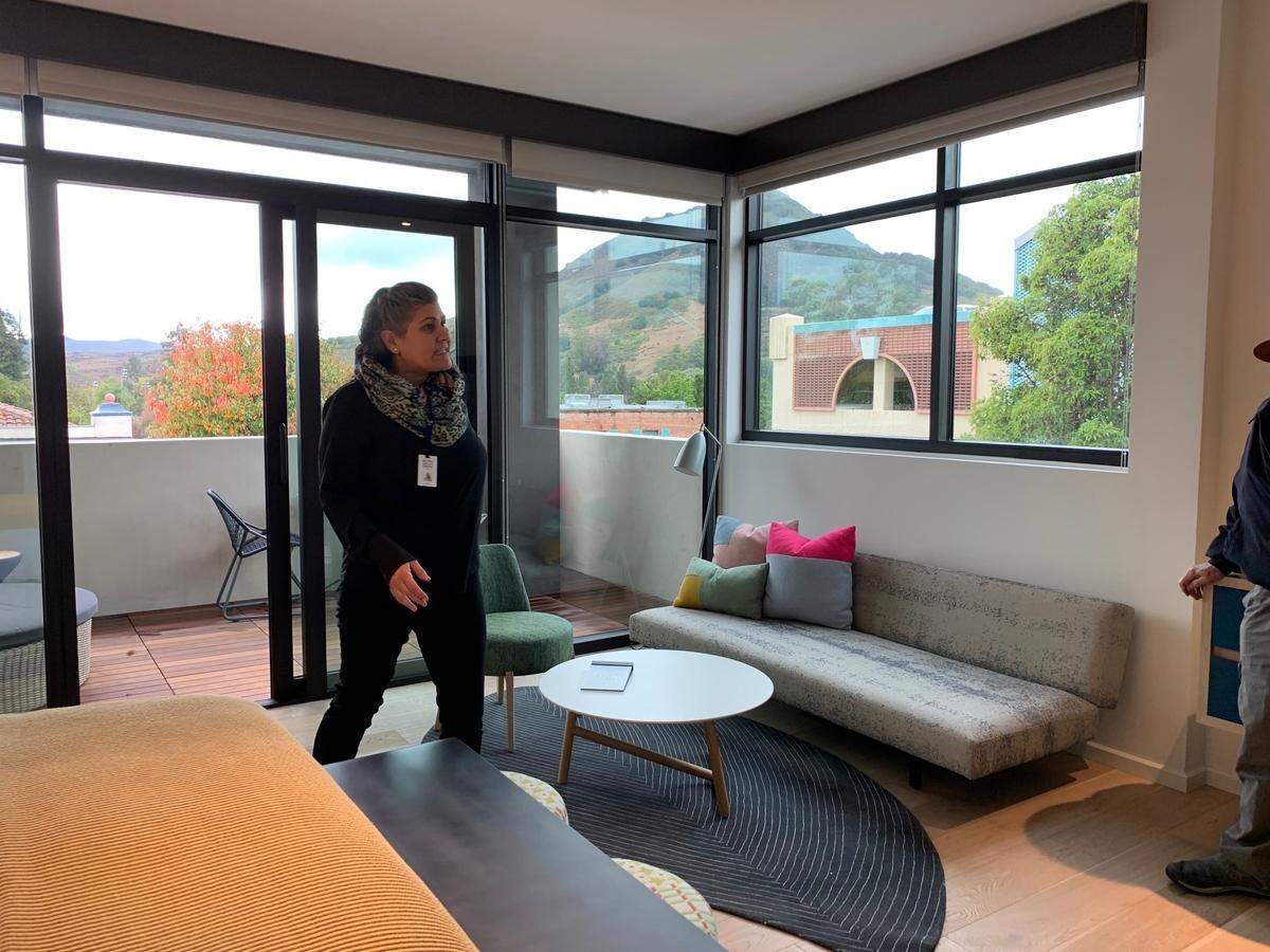 A corner suite at Hotel San Luis Obispo looks out over downtown at Cerro San Luis.