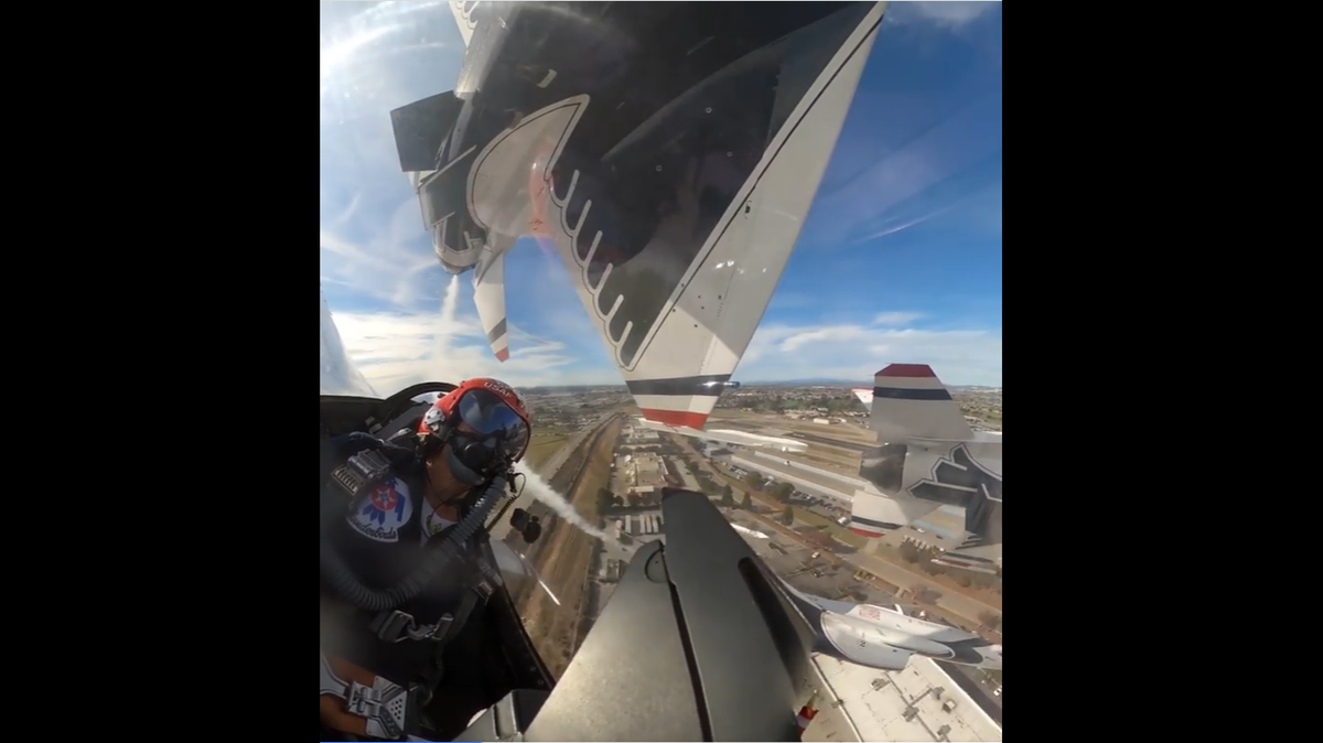 A flight video released by the Air Force Thunderbirds flight team shows the jets flying inches apart.