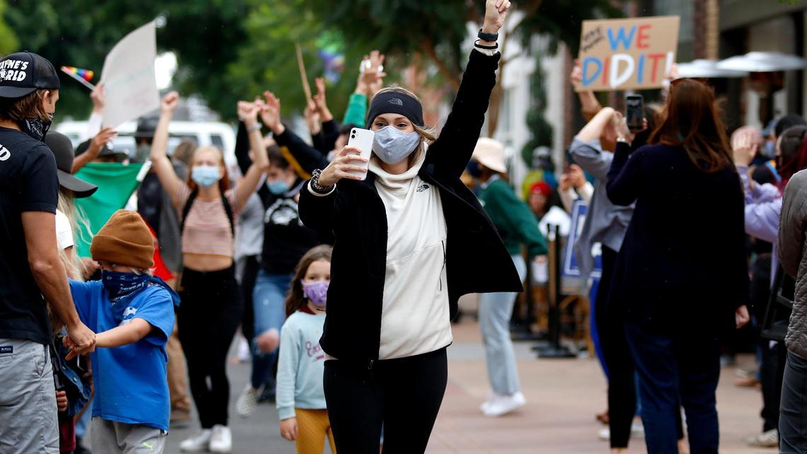 Biden supporters celebrate victory with a dance party in downtown SLO