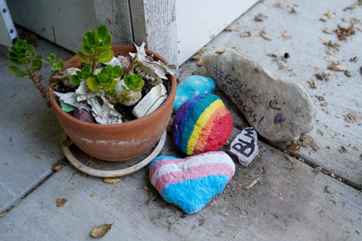 Painted rocks sit on the front porch of Selby, a young member of San Luis Obispo County’s LGBTQ+ community, pictured here Monday, June 30, 2025. Selby uses they/them pronouns and is a member of the LGBTQ+ community, founding their middle school’s Gay Straight Alliance.