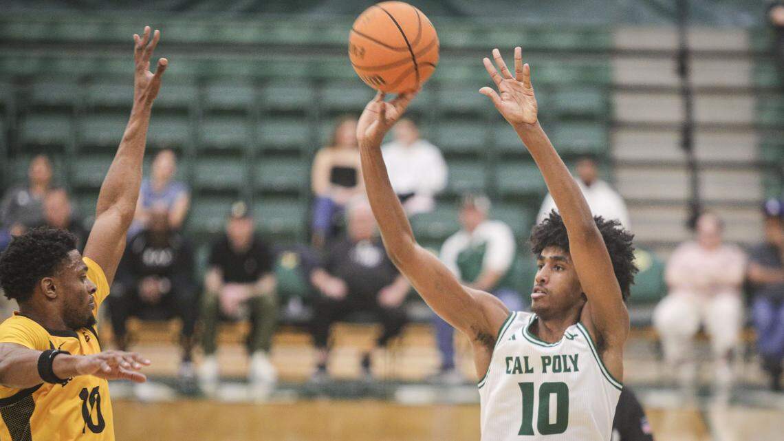 Hamad Mousa takes a shot as Cole Farrell closes in. Cal Poly beat Long Beach State102-92 on Feb. 26, 2026.