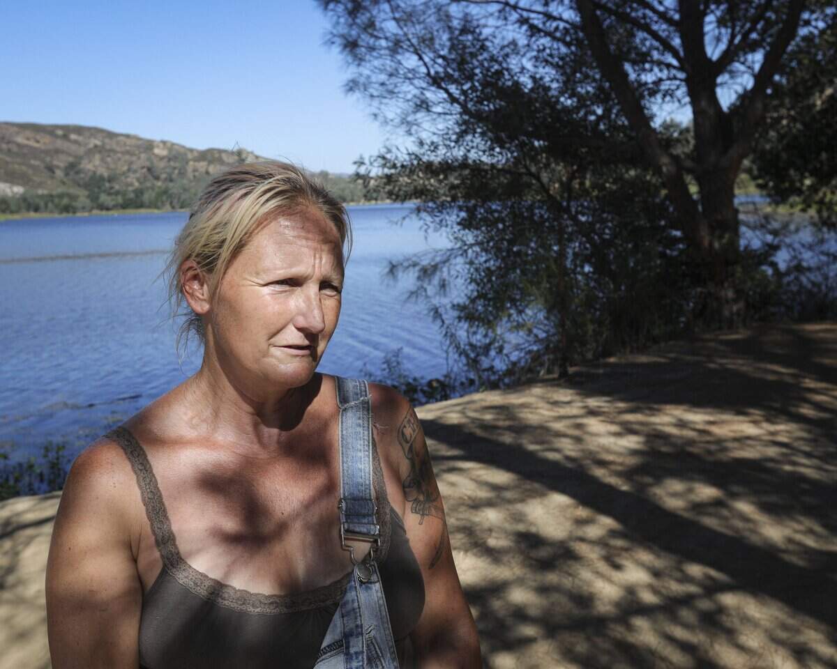 Amber Aguilera takes a break from fishing at Santa Margarita Lake on Sept. 2, 2026. A new law allows body contact with the water starting in January, but the details have yet to be worked out with San Luis Obispo County.