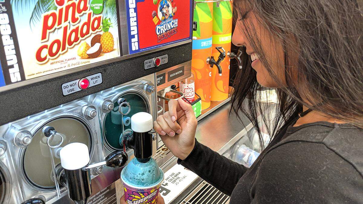 7-Eleven is giving away free Slurpees and selling hot dogs for $1 on Wednesday, July 11, to celebrate its 91st birthday.